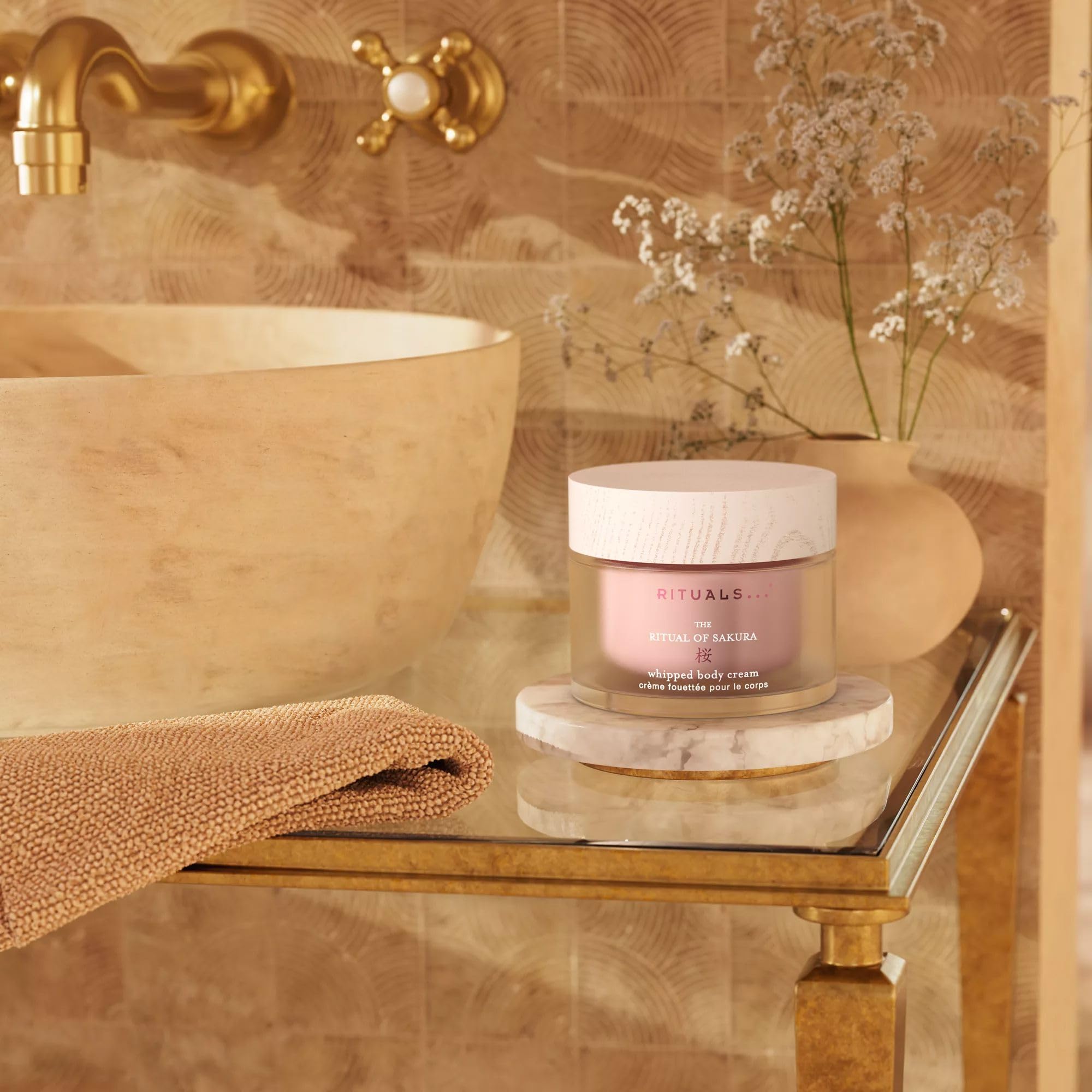 RITUALS Sakura Body Cream whipped texture shows quick, silky absorption.