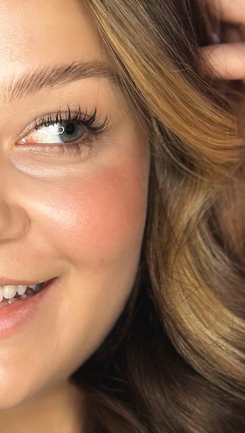 River Organics blush stick applied to eyes for cohesive color.