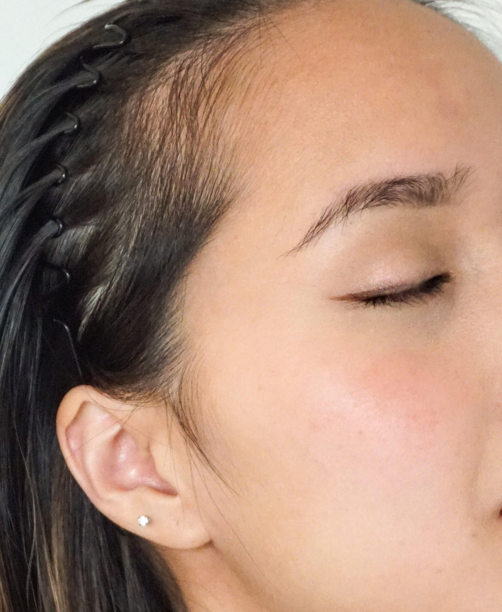 River Organics vegan blush stick applied to eyelids for cohesive daytime look