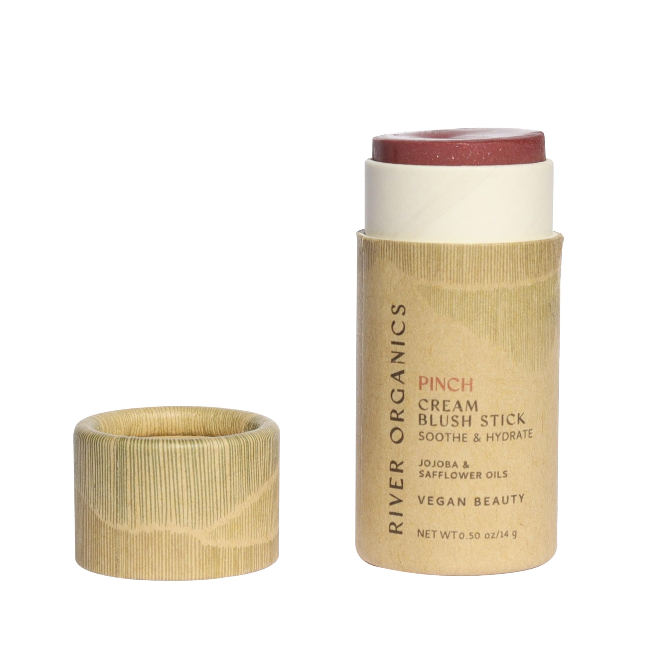 River Organics vegan blush stick swatches on cheek for natural warmth and glow.
