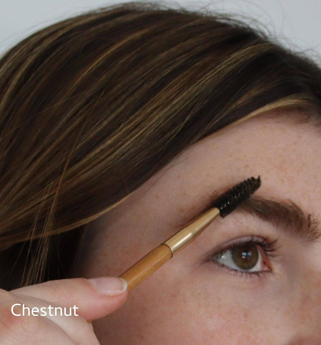 Close-up of River Organics Chestnut Brow Wax delivering natural, buildable hold.
