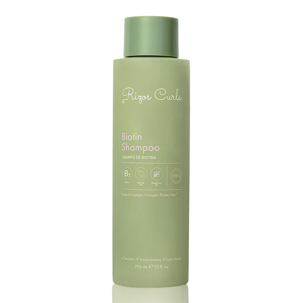 Rizos Curls Biotin Shampoo bottle front; nourishes and strengthens all hair types.