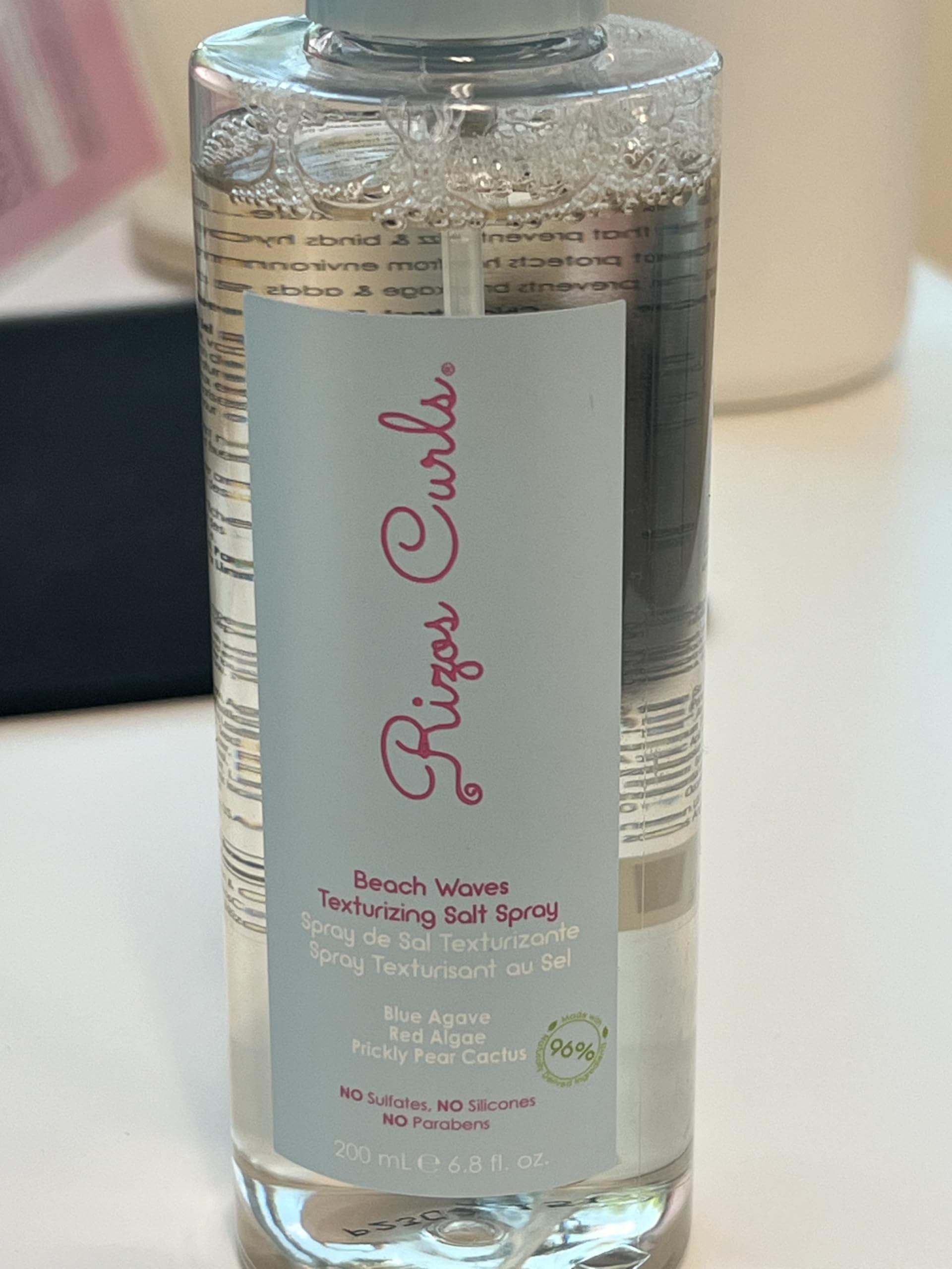 Rizos Curls Easy-styling spray for scrunch-and-go beach texture.