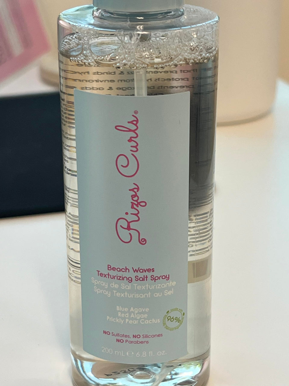 Rizos Curls Easy-styling spray for scrunch-and-go beach texture.