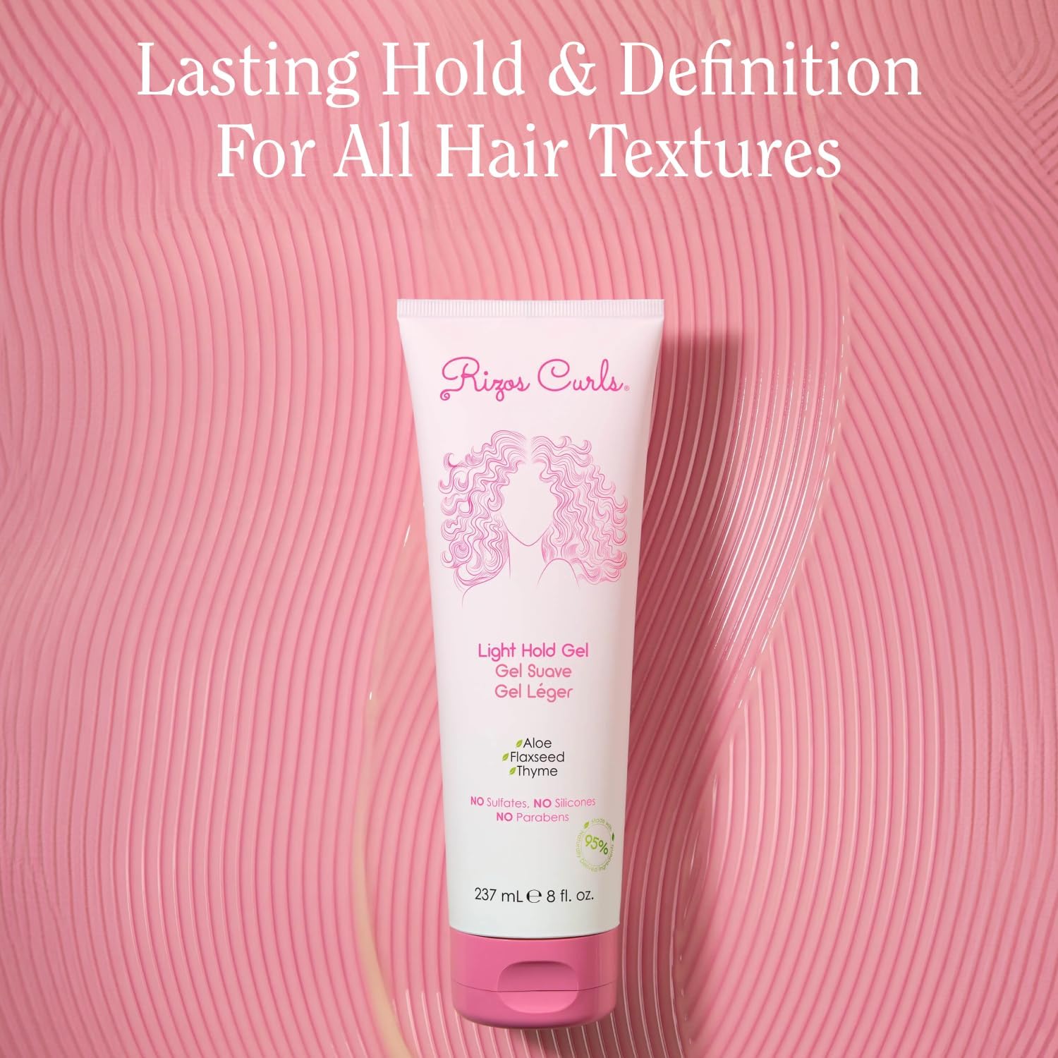 Rizos Curls Travel Light Hold Gel defines curls with soft, flaky-free texture.