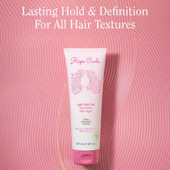 Rizos Curls Travel Light Hold Gel defines curls with soft, flaky-free texture.