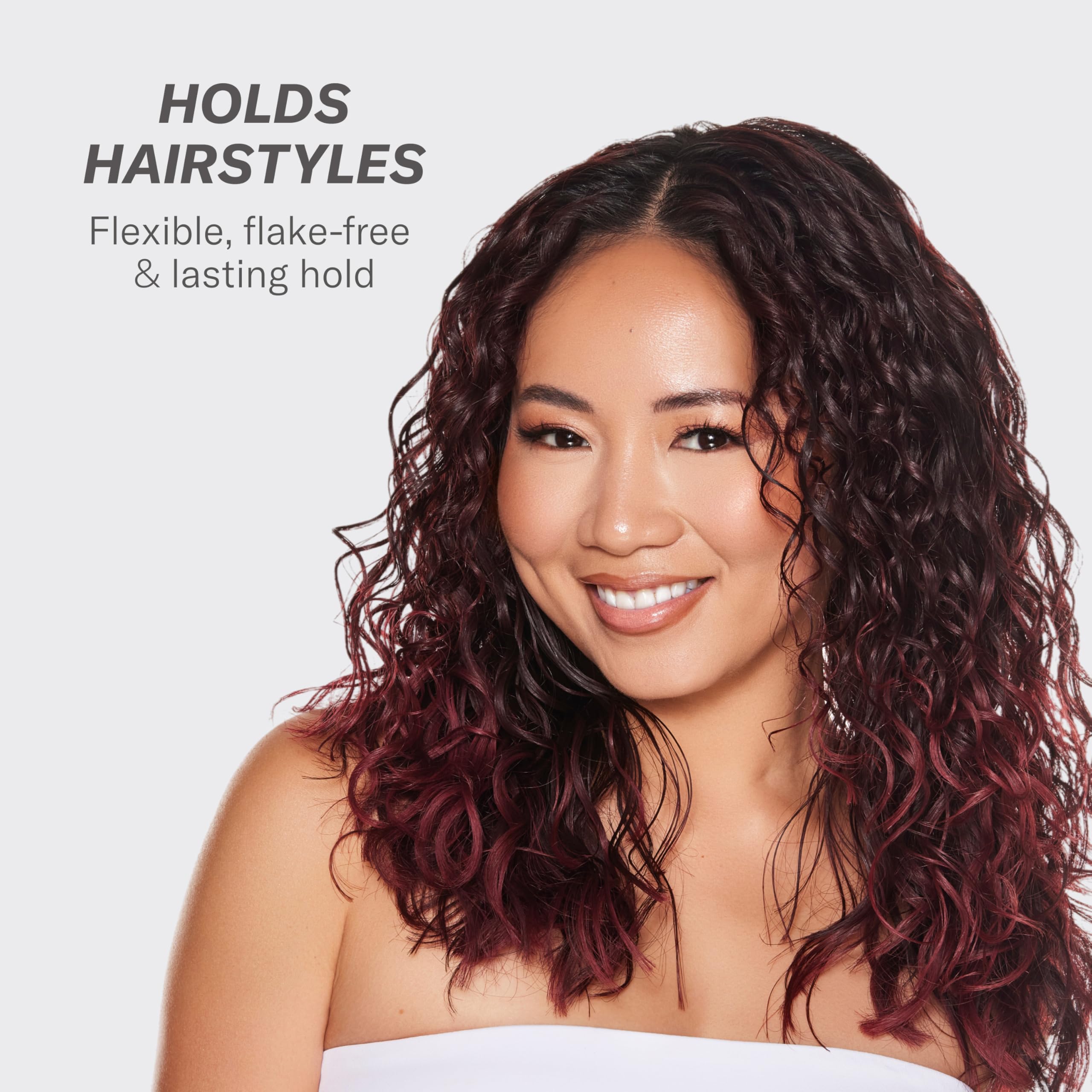 Rizos Curls Light Hold Gel being applied to damp hair for definition.