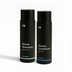 Ro Men's Revive Shampoo bottle displaying exfoliating scalp care for a fuller look