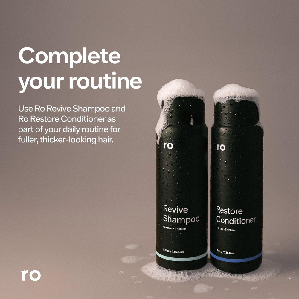 Ro Men's Revive Shampoo delivers caffeine for energized scalp cleansing.