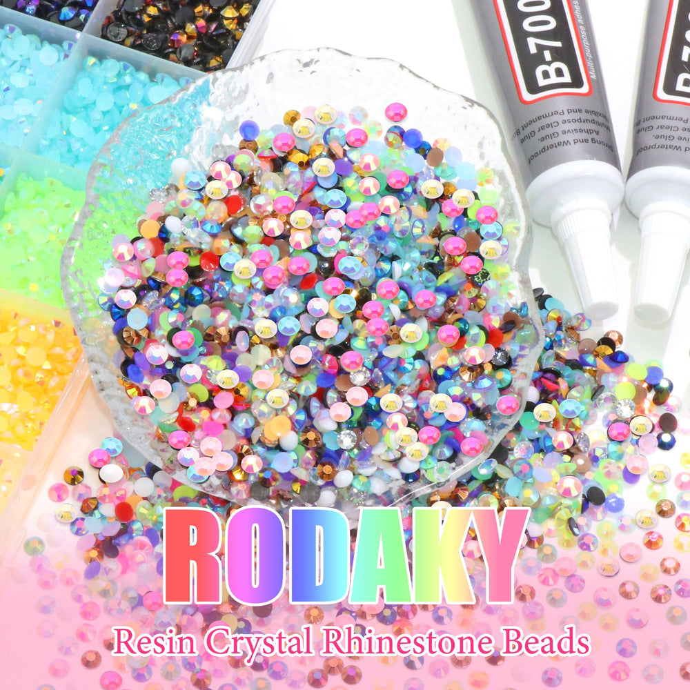 RODAKY finished nail art sparkles with AB rhinestones.