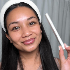 Rodan + Fields Lash Boost Serum packaging showcasing almond extract and skin-friendly formula.