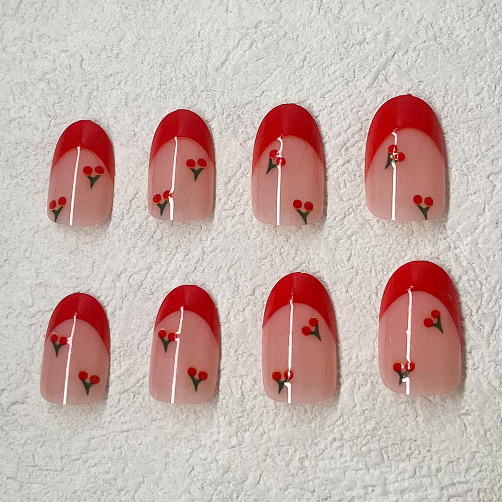 rofibut glossy red french tip close-up showing a wearable finish