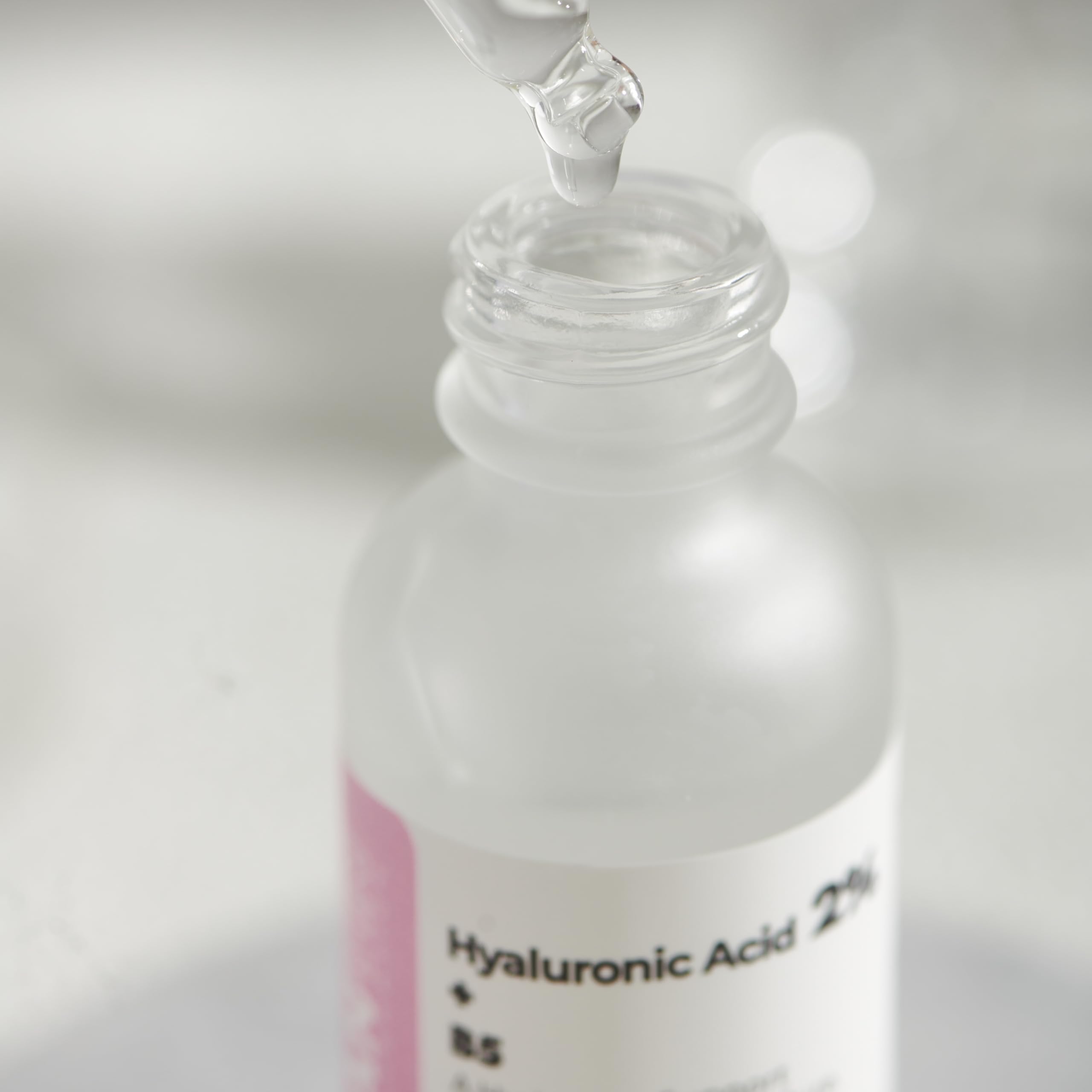 ROLANYIN serum applied to cheek showing lightweight non greasy finish