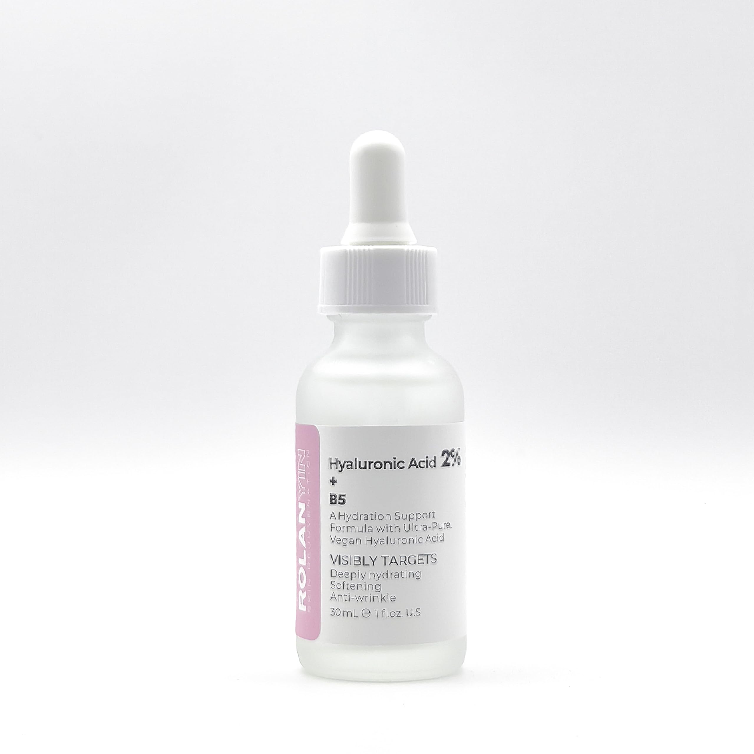 ROLANYIN serum on a minimalist bathroom shelf