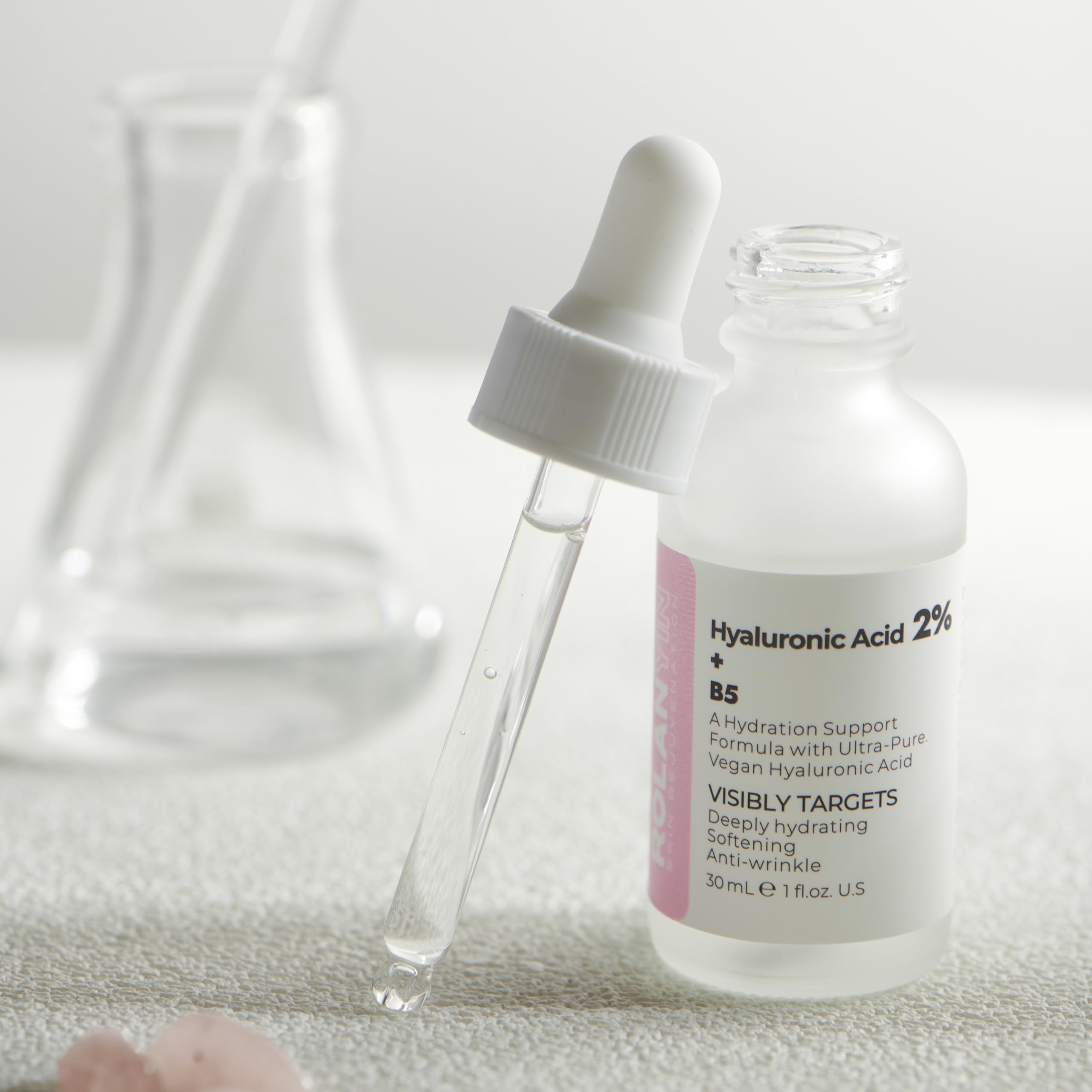 ROLANYIN packaging box next to bottle for clean skincare routine