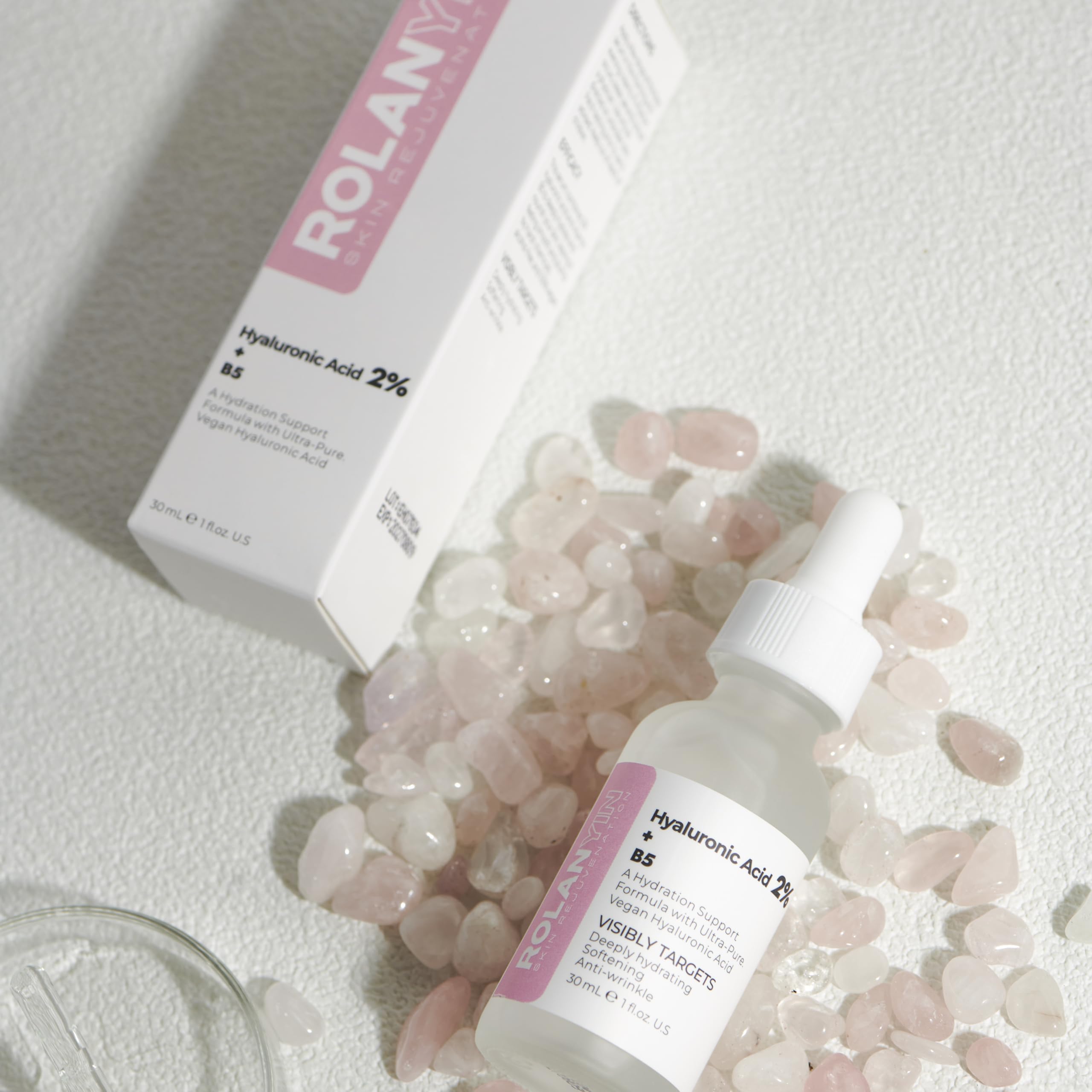 Close-up of ROLANYIN serum texture on finger for smooth application