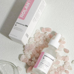 Close-up of ROLANYIN serum texture on finger for smooth application