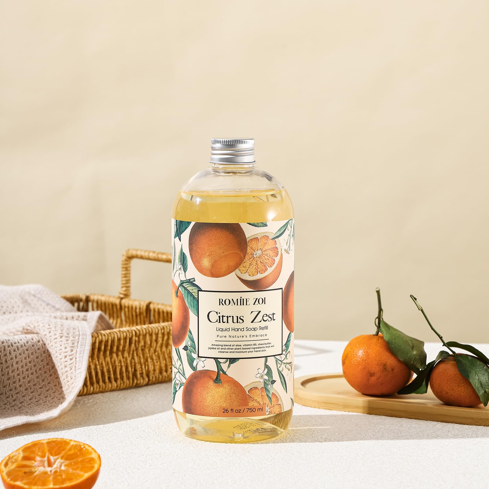 ROMIIE ZOI citrus label highlights jojoba oil and Vitamin B5 formula