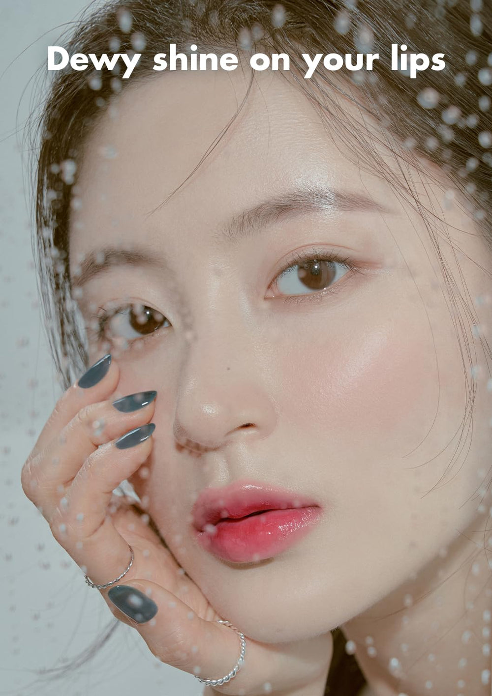 rom&nd DEWY·FUL Water Tint Salty Peach wet-look lip finish for daily glow.