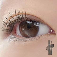 Rom&nd Han All Fix Mascara wand closeup shows a precise brush for curl.