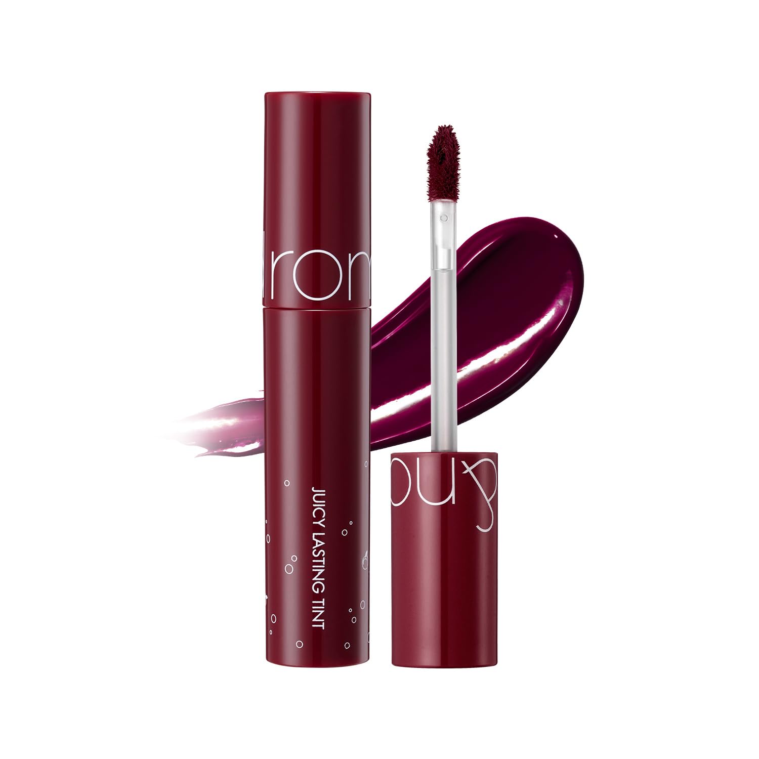 rom&nd Juicy Lasting Tint #17 Plum Coke bottle close-up for cool-toned looks.