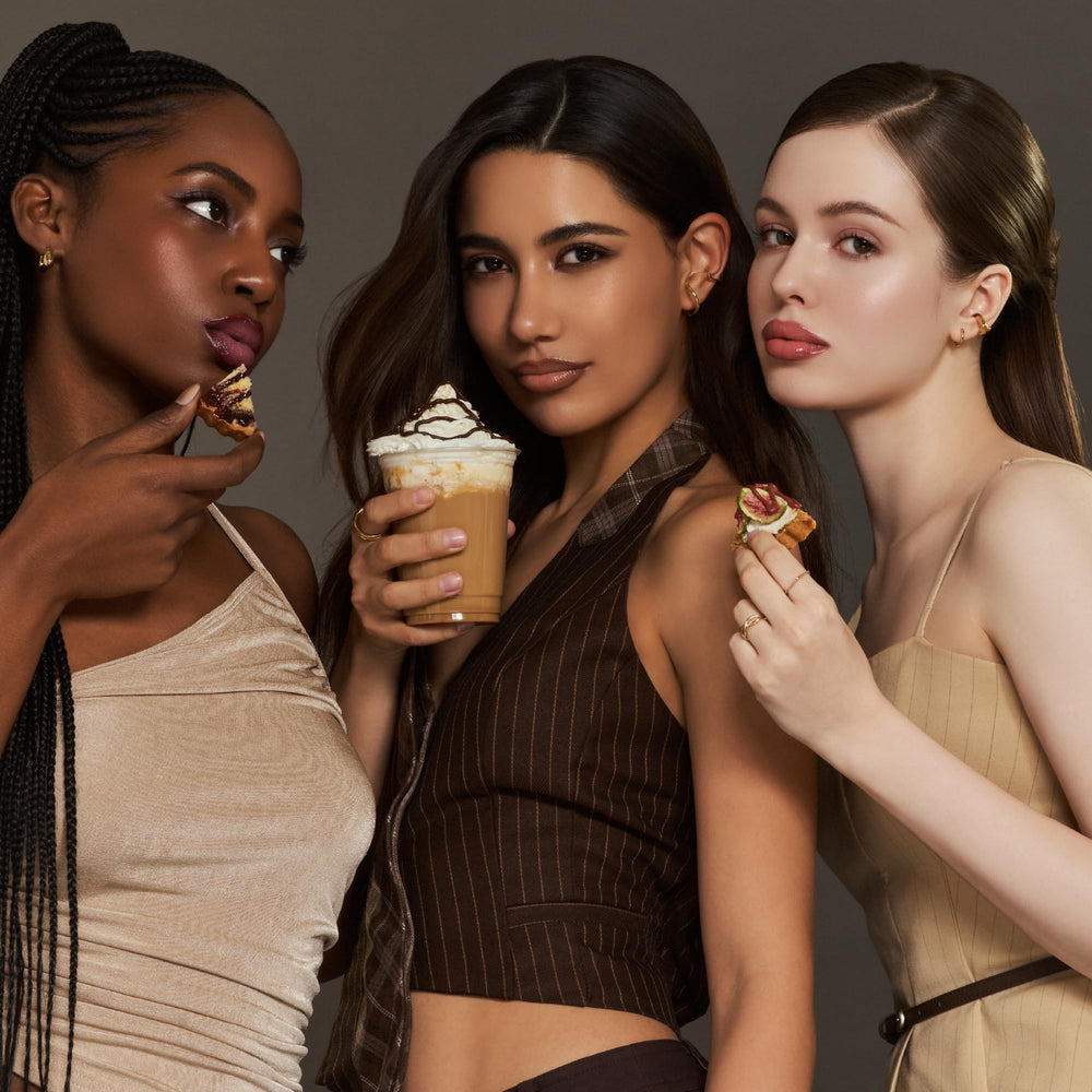 Model wearing the trio for a hydrated, voluminous lip look.