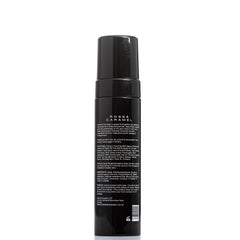 Deluxe Tanning Mitt demonstrates smooth, even coverage for streak-free application.