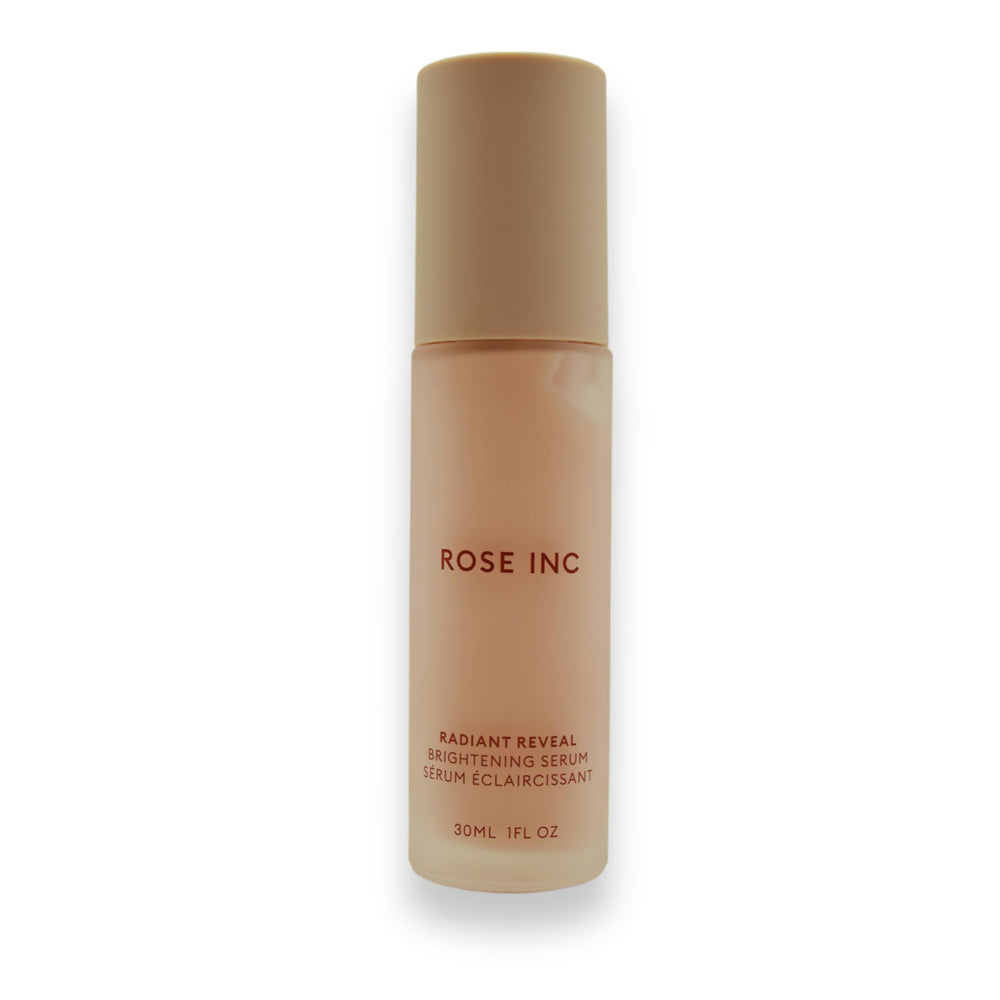 Rose Inc Radiant Reveal serum bottle close-up for brightening skin and even tone.