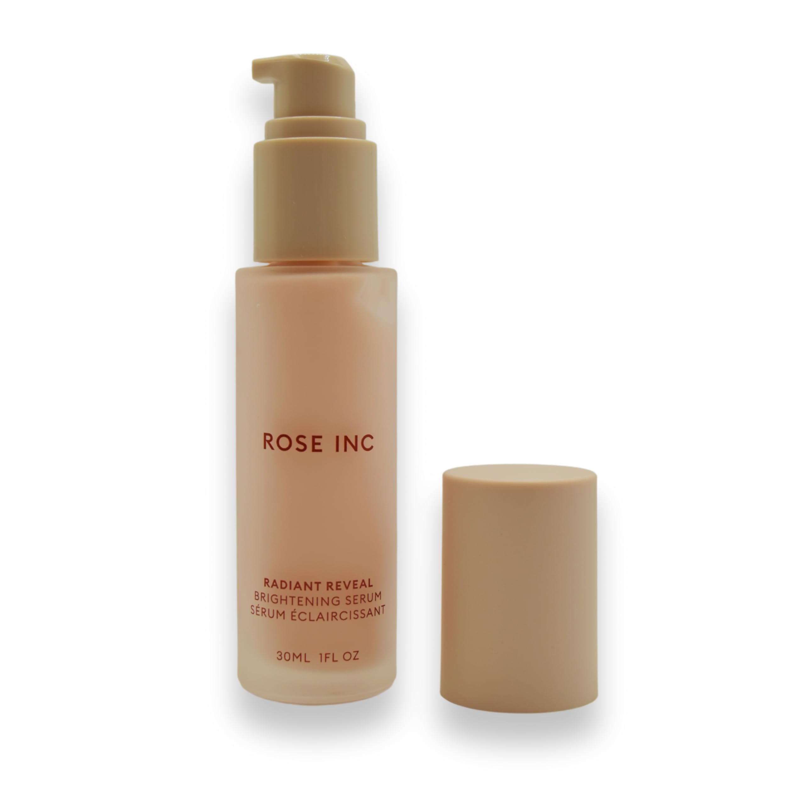Rose Inc Radiant Reveal serum packaging on display highlighting luxurious brightening.