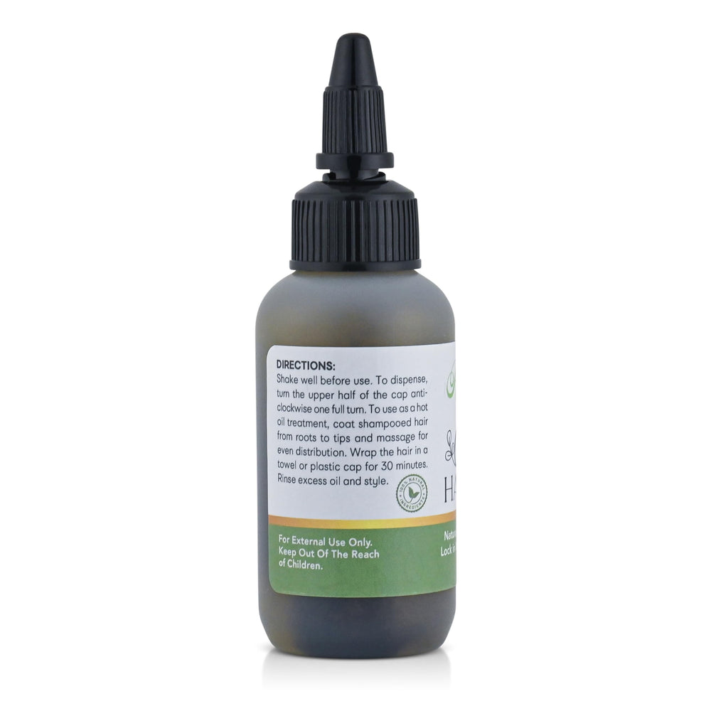 Roselle Naturals Chebe Oil droplet application on scalp for moisture