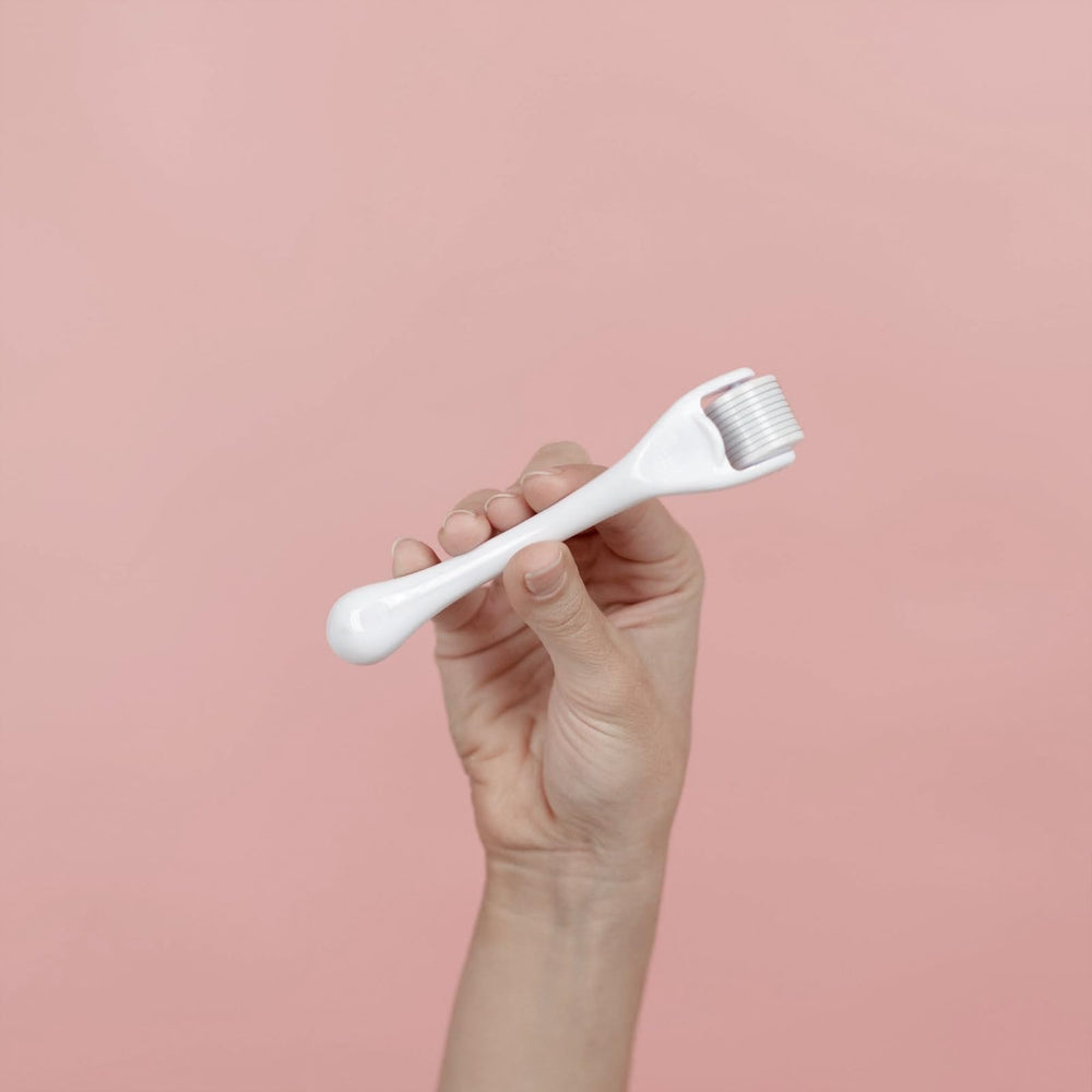 ROSELYNBOUTIQUE Derma Roller being held for portable use