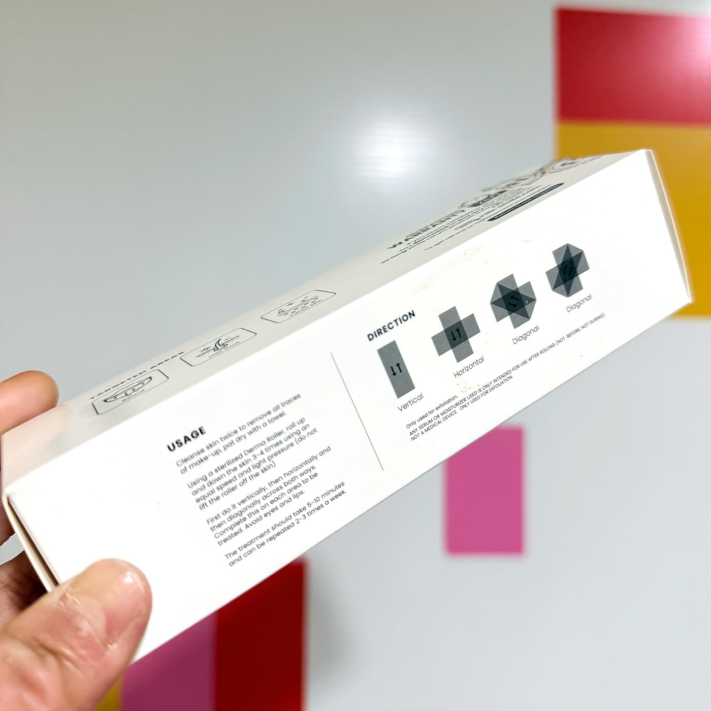 ROSELYNBOUTIQUE Derma Roller showing a gentle skin massage effect
