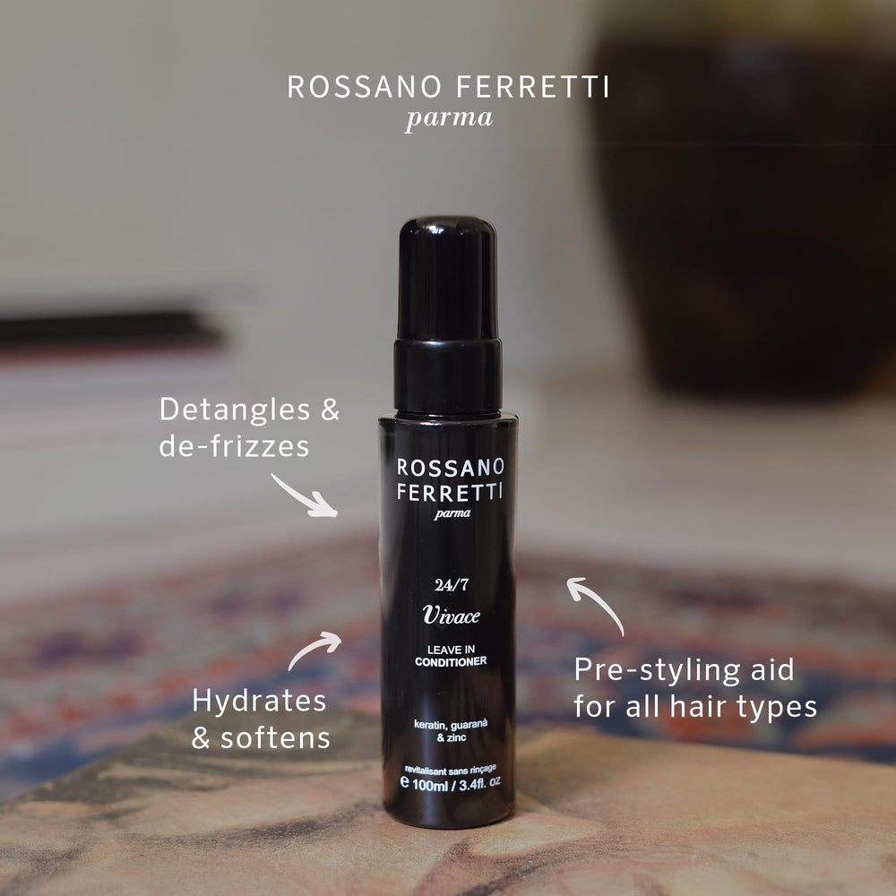 Vivace leave-in spray being applied to hair for detangling.