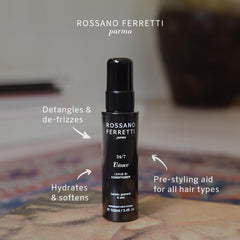 Vivace leave-in spray being applied to hair for detangling.
