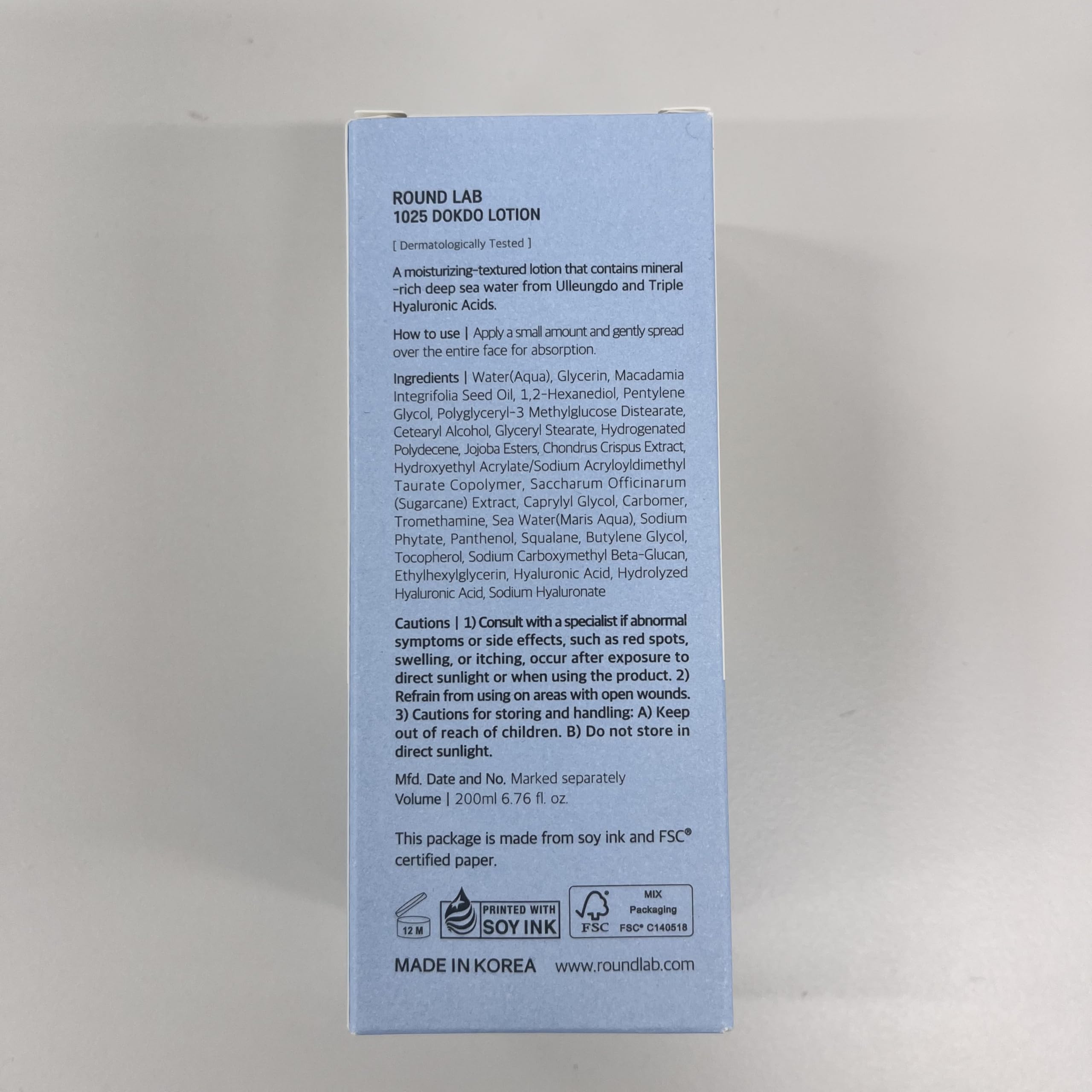 ROUND LAB 1025 Dokdo Lotion ingredient swatch highlights hydrating minerals.