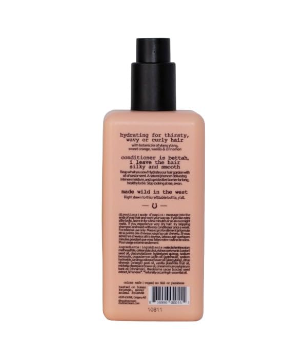 Applying Routine Deep Hair Conditioner to damp mid-length and ends