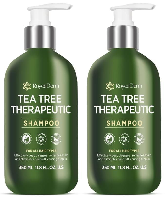 Roycederm Tea Tree Antifungal Shampoo bottle on a bathroom shelf for refreshing scalp care.