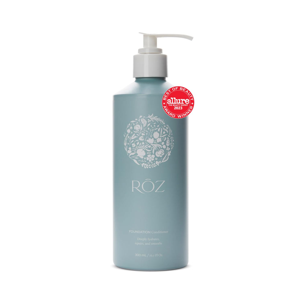 RŌZ Foundation Conditioner bottle being poured for deep hydration.