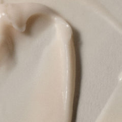 Top of RŌZ Foundation Conditioner cap with easy-dispense pump for daily use.