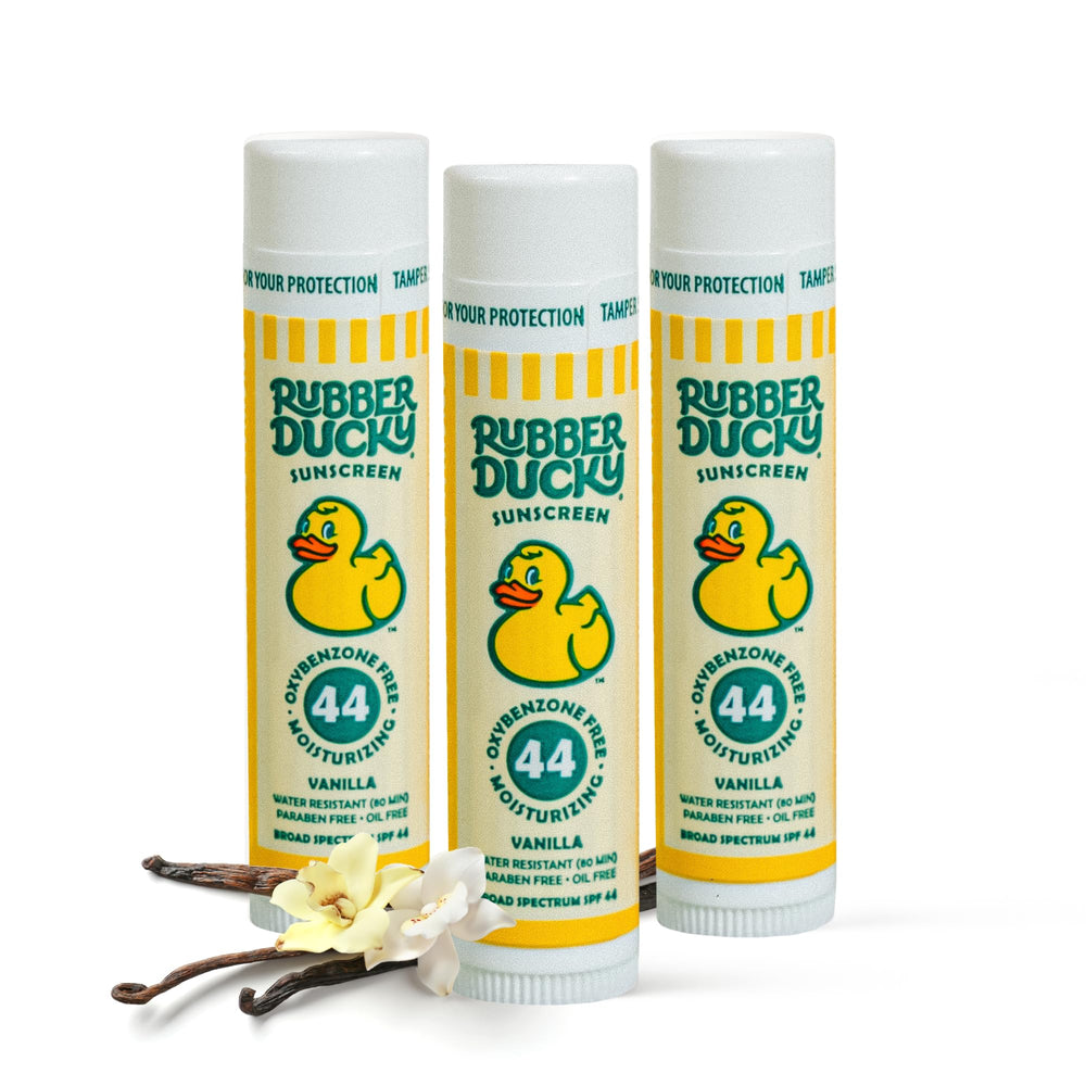 Rubber Ducky Lip Sunscreen SPF 44 untinted balm for kids' lips, vanilla flavor.