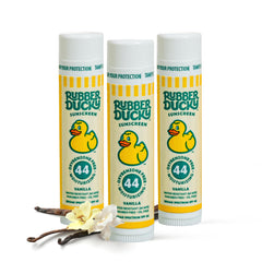Rubber Ducky Lip Sunscreen SPF 44 untinted balm for kids' lips, vanilla flavor.