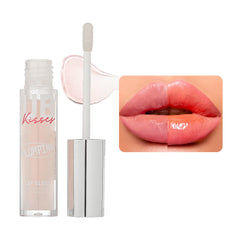Ruby Kisses Dreamsicle lip gloss wand application for instant shine and subtle plump.