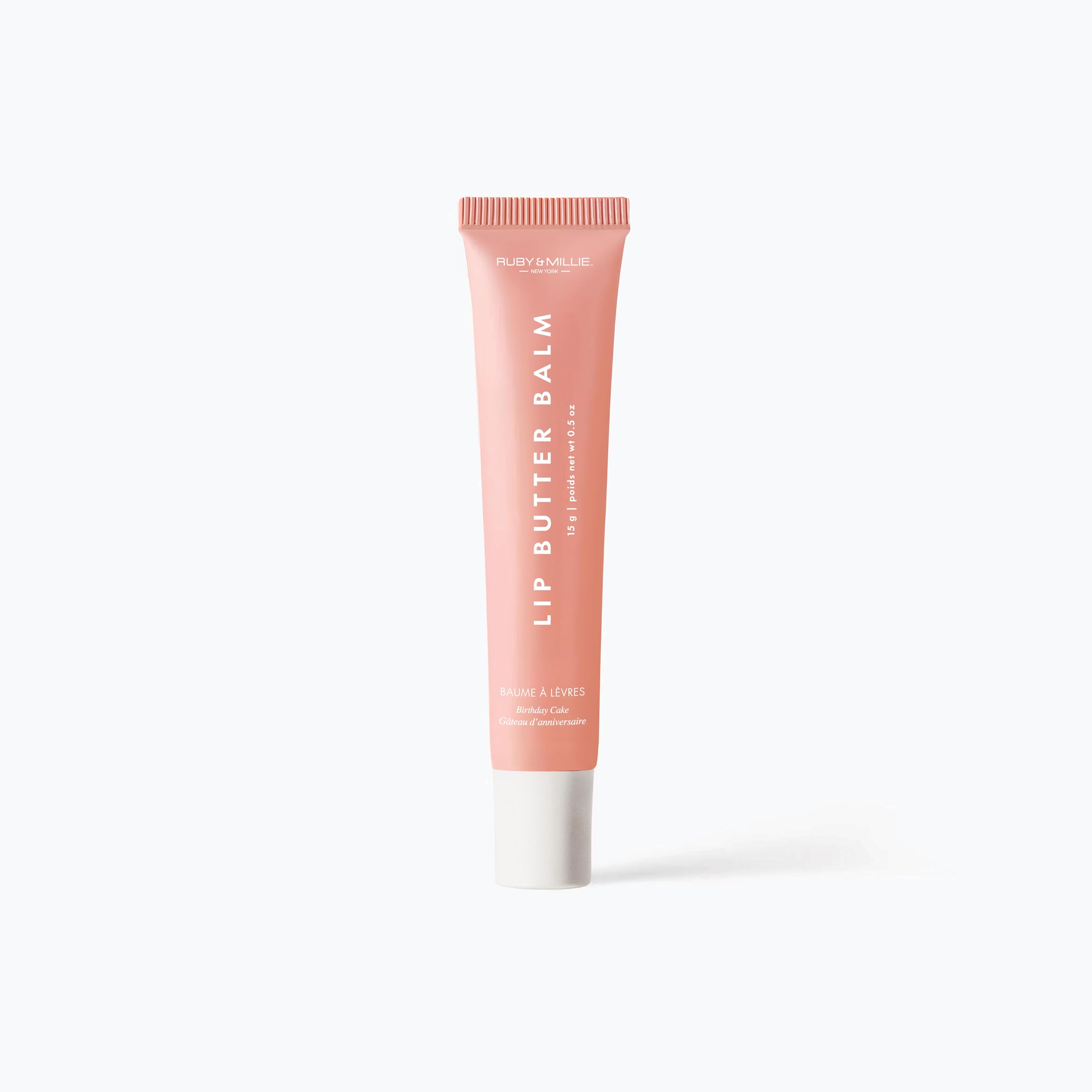 Ruby & Millie vegan lip balm compact for purse-ready hydration.