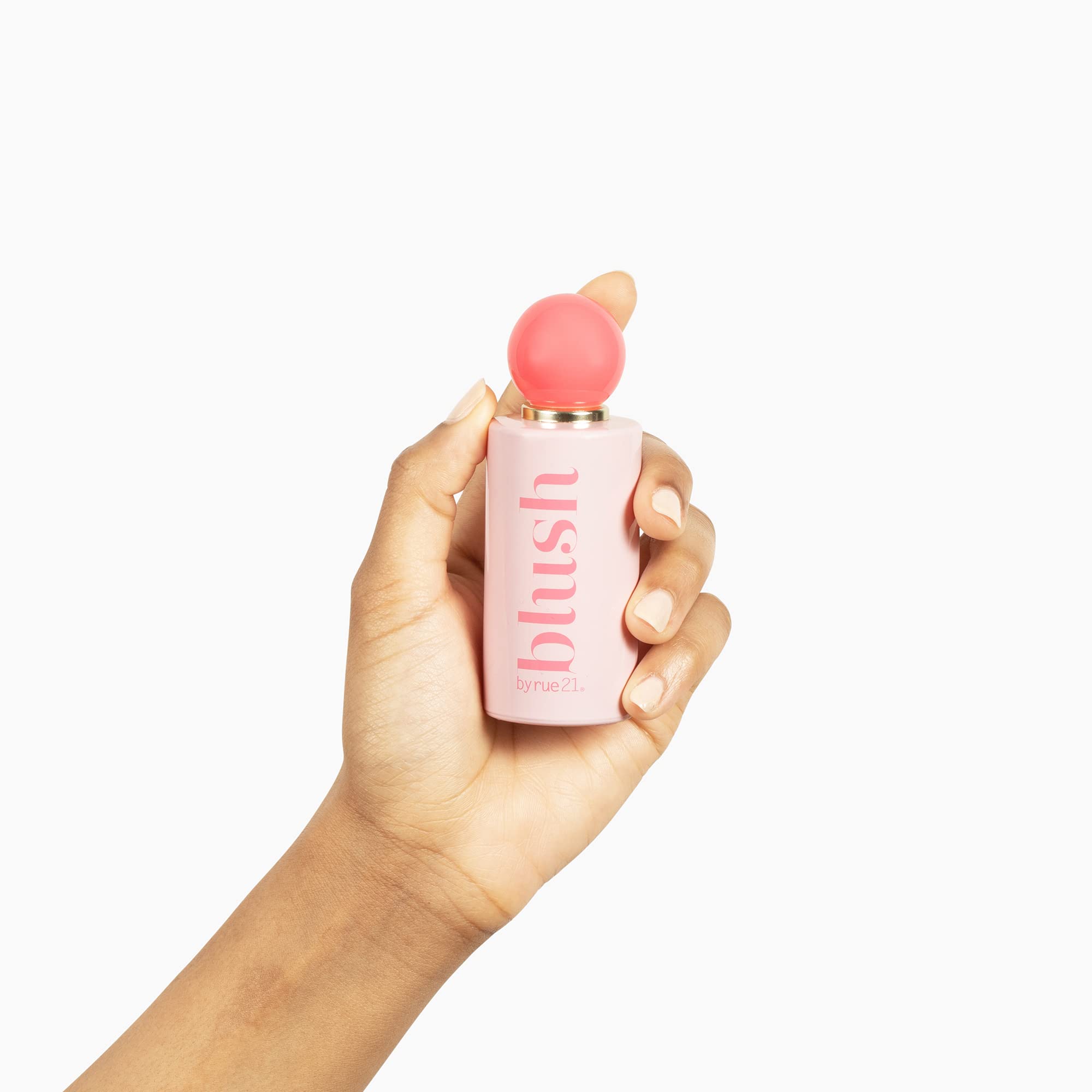 Rue 21 Blush pink-cap bottle conveying a playful feminine vibe