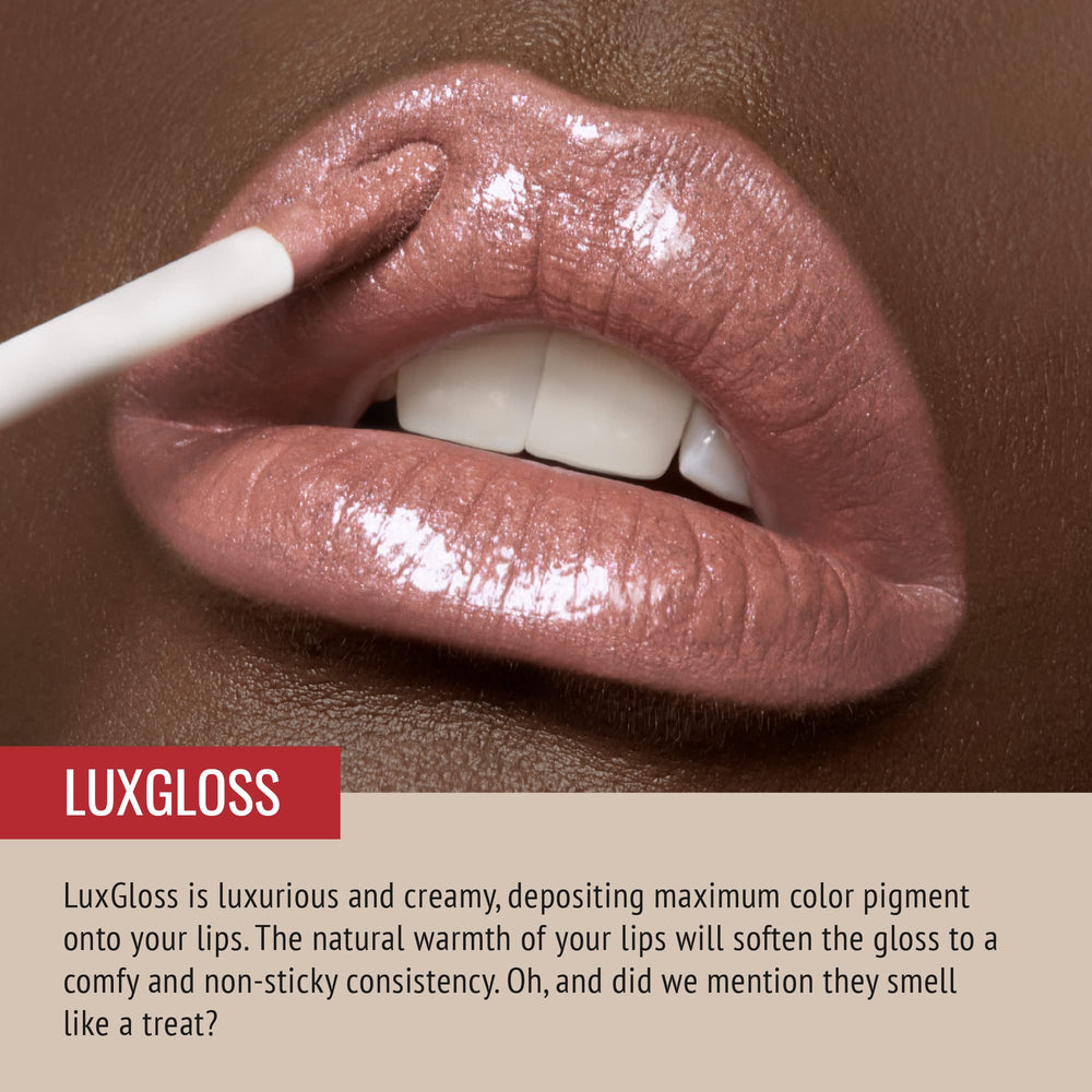 Runway Rogue LuxGloss Fashion Week bottle close-up with rose-gold shimmer for a luxe finish.