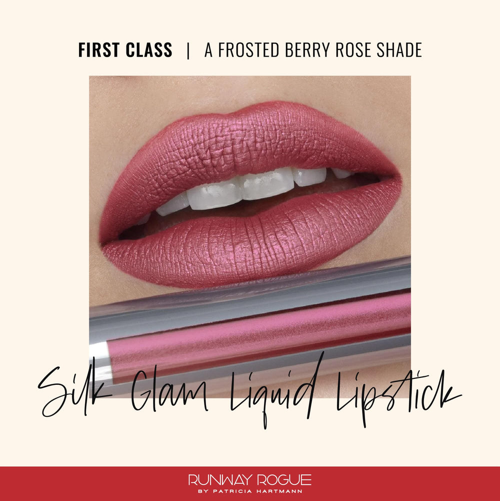 Runway Rogue Silk Glam First Class swatch on arm demonstrates frosted berry-rose color.