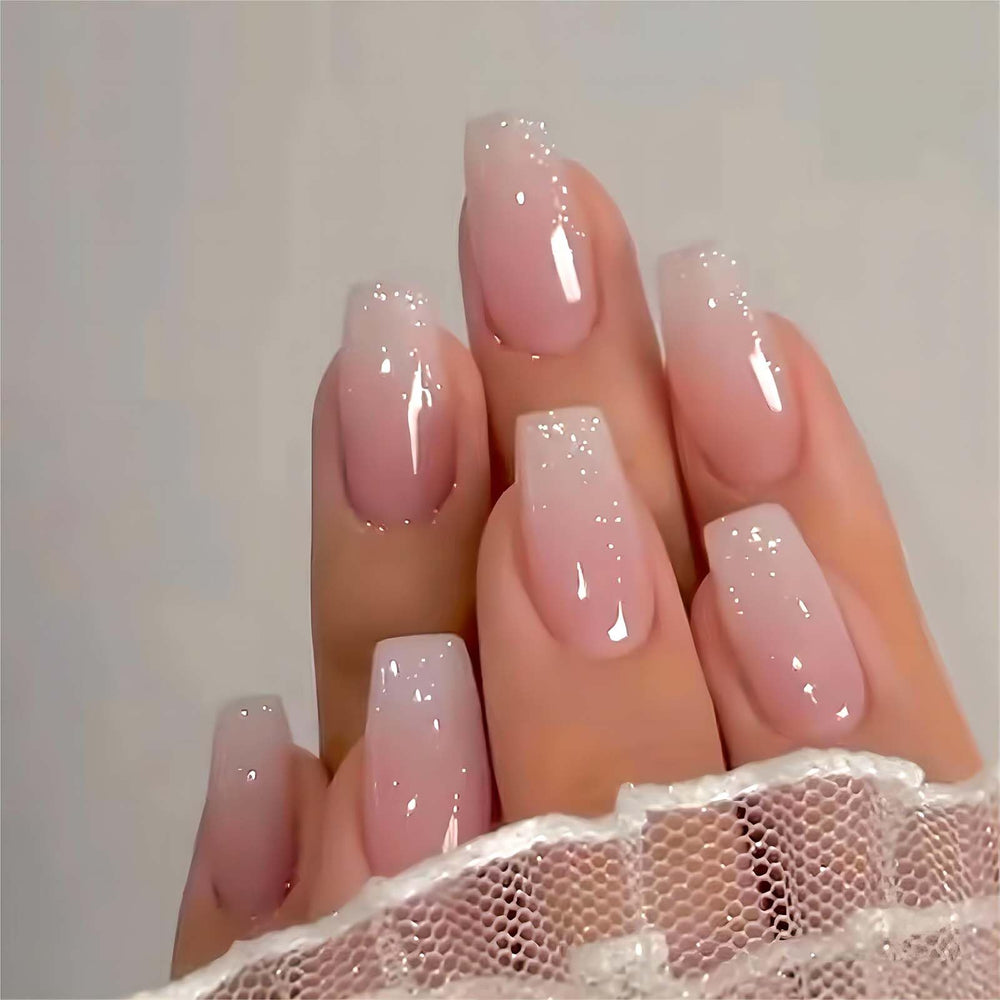 RUOKEXIN pink press on nails in coffin shape with glossy ombre glitter for quick at-home manicure