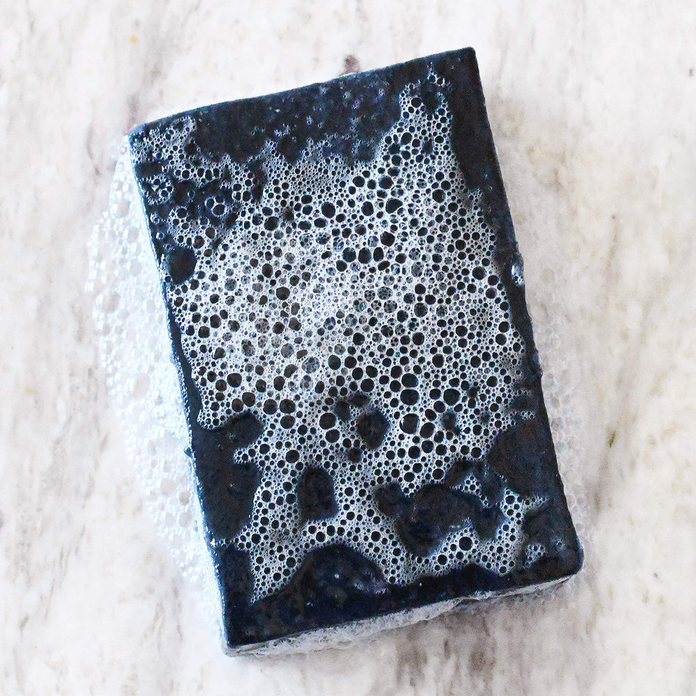 Rustic Maka soap with olive, coconut, and palm oils supports gentle cleansing