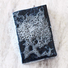 Rustic Maka soap with olive, coconut, and palm oils supports gentle cleansing