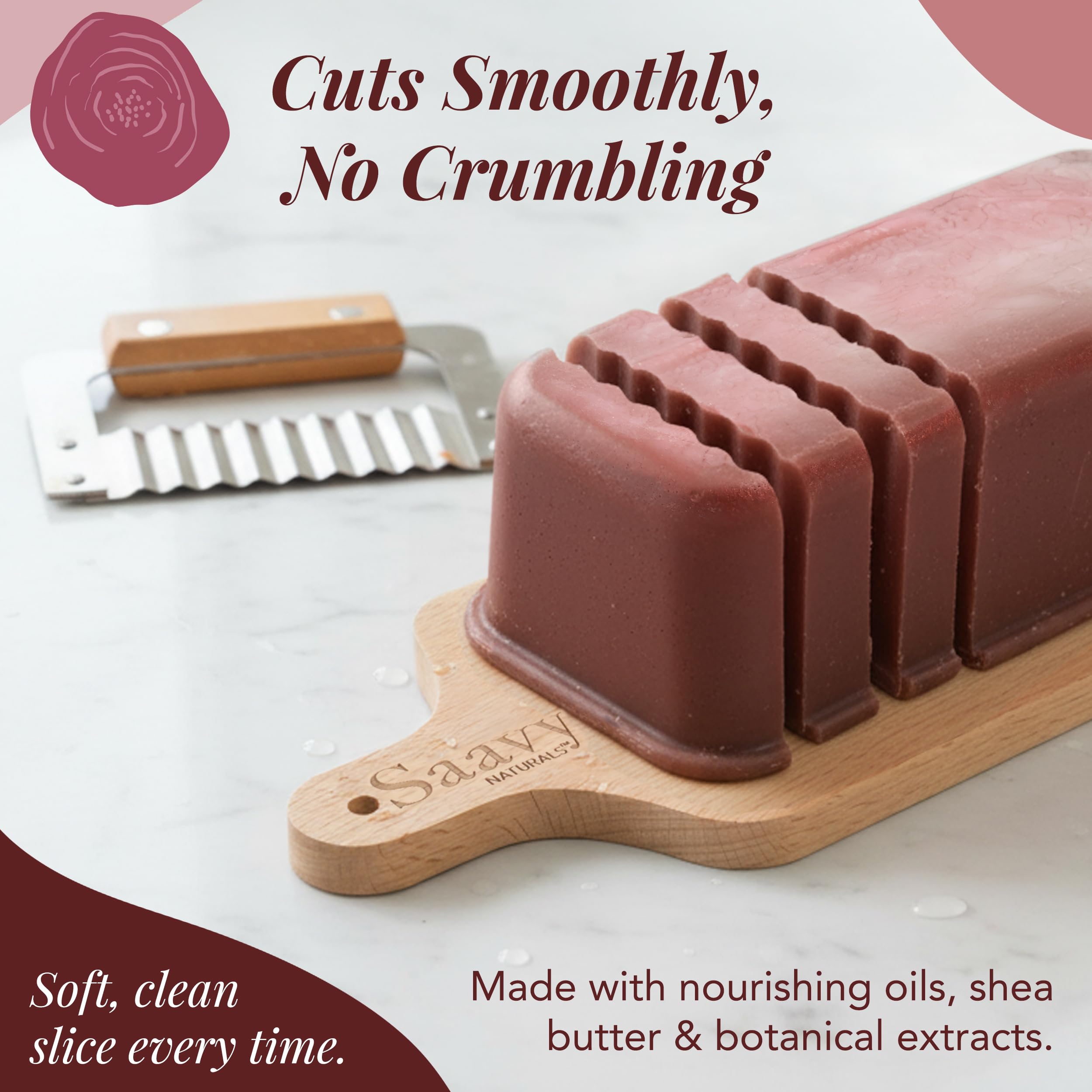 Patchouli Rose soap loaf close-up showing creamy lather and texture.